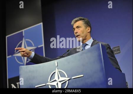 (140625) -- BRÜSSEL, 25. Juni 2014 (Xinhua) -- NATO-Generalsekretär anders Fogh Rasmussen spricht auf einer Pressekonferenz während der NATO-Außenministertreffen am 25. Juni 2014 in Brüssel, Hauptstadt von Brüssel. (Xinhua/YE Pingfan) BELGIEN-BRÜSSEL-NATO-FM-TREFFEN PUBLICATIONxNOTxINxCHN Brüssel Juni 25 2014 XINHUA NATO-Generalsekretär anders Fogh Rasmussen spricht auf einer Pressekonferenz während der NATO-Außenministertreffen in Brüssel-Hauptstadt Juni 25 2014 XINHUA YE Pingfan Belgien Brüssel NATO FM-Treffen PUBLICATIONxNOTxCHN Stockfoto