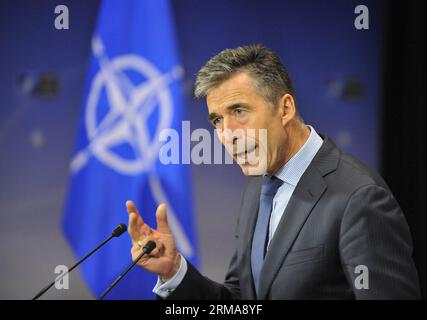 (140625) -- BRÜSSEL, 25. Juni 2014 (Xinhua) -- NATO-Generalsekretär anders Fogh Rasmussen spricht auf einer Pressekonferenz während der NATO-Außenministertreffen am 25. Juni 2014 in Brüssel, Hauptstadt von Brüssel. (Xinhua/YE Pingfan) BELGIEN-BRÜSSEL-NATO-FM-TREFFEN PUBLICATIONxNOTxINxCHN Brüssel Juni 25 2014 XINHUA NATO-Generalsekretär anders Fogh Rasmussen spricht auf einer Pressekonferenz während der NATO-Außenministertreffen in Brüssel-Hauptstadt Juni 25 2014 XINHUA YE Pingfan Belgien Brüssel NATO FM-Treffen PUBLICATIONxNOTxCHN Stockfoto