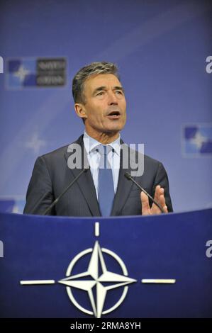 (140625) -- BRÜSSEL, 25. Juni 2014 (Xinhua) -- NATO-Generalsekretär anders Fogh Rasmussen spricht auf einer Pressekonferenz während der NATO-Außenministertreffen am 25. Juni 2014 in Brüssel, Hauptstadt von Brüssel. (Xinhua/YE Pingfan) BELGIEN-BRÜSSEL-NATO-FM-TREFFEN PUBLICATIONxNOTxINxCHN Brüssel Juni 25 2014 XINHUA NATO-Generalsekretär anders Fogh Rasmussen spricht auf einer Pressekonferenz während der NATO-Außenministertreffen in Brüssel-Hauptstadt Juni 25 2014 XINHUA YE Pingfan Belgien Brüssel NATO FM-Treffen PUBLICATIONxNOTxCHN Stockfoto