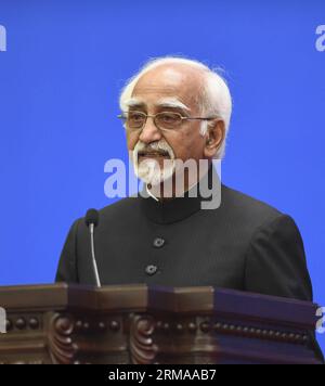 (140628) -- BEIJING, June 28, 2014 (Xinhua) -- Indian Vice President Mohammad Hamid Ansari addresses a conference marking the 60th anniversary of the Five Principles of Peaceful Coexistence at the Great Hall of the People in Beijing, capital of China, June 28, 2014. (Xinhua/Li Xueren)(wjq) CHINA-BEIJING-INDIAN VICE PRESIDENT-CONFERENCE (CN) PUBLICATIONxNOTxINxCHN   Beijing June 28 2014 XINHUA Indian Vice President Mohammad Hamid Ansari addresses a Conference marking The 60th Anniversary of The Five Principles of peaceful  AT The Great Hall of The Celebrities in Beijing Capital of China June 28 Stock Photo