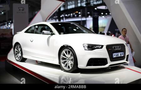 (140630) -- SHENGYANG, 30. Juni 2014 (Xinhua) -- ein Audi RS5 wird auf der China (Shenyang) Auto Industry Expo 2014 in Shenyang, der Hauptstadt der nordöstlichen Provinz Liaoning, am 30. Juni 2014 ausgestellt. Die 6-tägige Autoshow endete hier am Montag. (Xinhua/Yao Jianfeng) (hdt) CHINA-SHENYANG-AUTO INDUSTRY-EXPO (CN) PUBLICATIONxNOTxINxCHN Sheng Yang Juni 30 2014 XINHUA zu Audi RS5 WIRD AUF der China Shenyang Car Industry EXPO 2014 in Shenyang Hauptstadt von Nordostchina S Liaoning Provinz Juni 30 2014 die 6-tägige Car Show endete hier AM Montag XINHUA Yao Jianfeng HDT China Shenyang Car Industry EXP Stockfoto