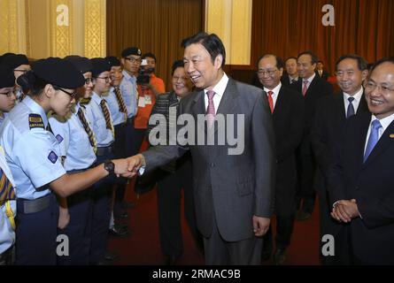 (140701) -- BEIJING, July 1, 2014 (Xinhua) -- Chinese Vice President Li Yuanchao (C) meets with members of a visiting joint delegation of Hong Kong students at the Great Hall of the People in Beijing, capital of China, July 1, 2014. (Xinhua/Pang Xinglei) (lmm) CHINA-BEIJING-LI YUANCHAO-HONG KONG-STUDENTS-MEETING (CN) PUBLICATIONxNOTxINxCHN   Beijing July 1 2014 XINHUA Chinese Vice President left Yuan Chao C Meets With Members of a Visiting Joint Delegation of Hong Kong Students AT The Great Hall of The Celebrities in Beijing Capital of China July 1 2014 XINHUA Pang Xinglei lmm China Beijing le Stock Photo