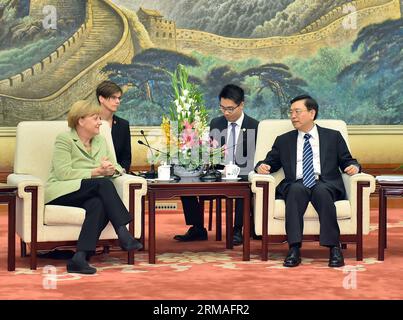 (140707) -- BEIJING, July 7, 2014 (Xinhua) -- Zhang Dejiang (1st R), chairman of the Standing Committee of China s National People s Congress, shakes hands with German Chancellor Angela Merkel in Beijing, capital of China, July 7, 2014. (Xinhua/Li Tao) (wjq) CHINA-BEIJING-ZHANG DEJIANG-MERKEL-MEETING (CN) PUBLICATIONxNOTxINxCHN   Beijing July 7 2014 XINHUA Zhang Dejiang 1st r Chairman of The thing Committee of China S National Celebrities S Congress Shakes Hands With German Chancellor Angela Merkel in Beijing Capital of China July 7 2014 XINHUA left Tao  China Beijing Zhang Dejiang Merkel Meet Stock Photo