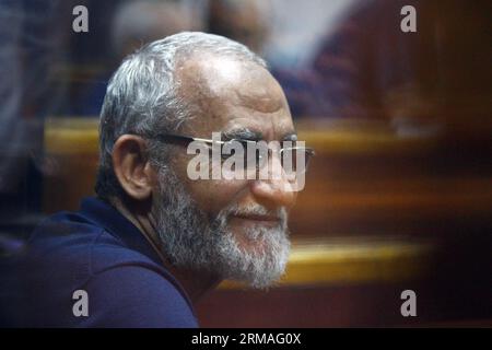 (140707) -- CAIRO, July 7, 2014 (Xinhua) -- Egyptian Muslim Brotherhood leader Mohamed Badie is seen inside a glass defendants cage during his trial in Cairo, Egypt, july 7, 2014. A Cairo court on Monday adjourned the trial of the deposed Islamist president Mohamed Morsi and his co-defendants over the charge of jailbreak to July 13. (Xinhua/Ahmed Gomaa) EGYPT-CAIRO-MORSI-TRIAL PUBLICATIONxNOTxINxCHN Stock Photo