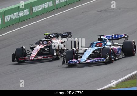 Zandvoort, Netherlands. 27th Aug, 2023. Zandvoort, Netherlands, 27. August 2023; Dutch FIA Formula 1 Grand Prix, The race, #31, Esteban OCON, FRA, Alpine F1 Team, Alpine A523 Renault, #24, Guanyu ZHOU, CHN, Alfa Romeo Racing F1 Team, C43, F065 engine, Formel 1 in Holland, picture and copyright by Arthur THILL/ATP images (THILL Arthur/ATP/SPP) Credit: SPP Sport Press Photo. /Alamy Live News Stock Photo