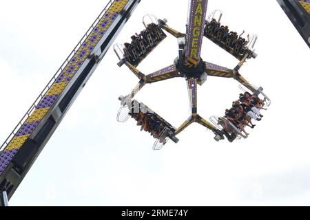 Achterbahnfahrt auf dem Boardmasters Festival Stockfoto