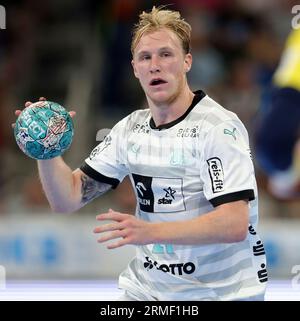 firo: 23/2023 1. Bundesliga-Handball-Supercup-Endspiel Männer THW Kiel - Rhein Neckar Lowen. Single Action, Eric Johansson, THW Stockfoto