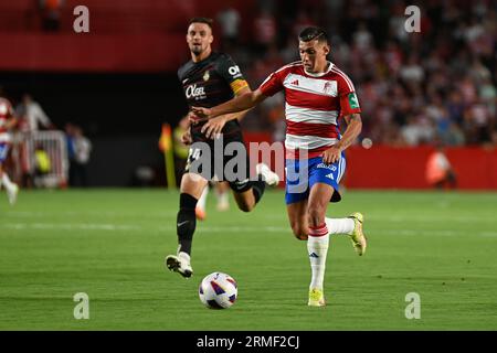 Granada, Spanien. 26. August 2023. Myrto Uzuni von Granada CF in Aktion beim Ligaspiel zwischen Granada CF und RCD Mallorca im Nuevo Los Carmenes Stadium am 26. August 2023 in Granada, Spanien. (Foto: José M. Baldomero/Pacific Press/SIPA USA) Credit: SIPA USA/Alamy Live News Stockfoto