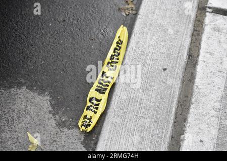 Crime scene tape left on the ground in front of the home where Andrew Jerome Washington was shot and killed by police. Jersey City Mayor Steven Fulop and Public Safety Director James Shea hold a news conference in Jersey City. The Mayor and Public Safety Director say that the officer involved shooting of a mentally ill man was justified. The New Jersey Attorney General is investigating a police-involved shooting in Jersey City that left one man dead. Officers responded to the home on Randolph Avenue near Bramhall Avenue before 2:30 p.m. Sunday after EMS requested police. Officials say police w Stock Photo