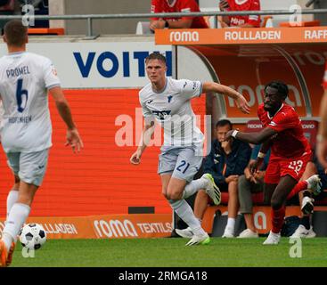 August 26, 2023, Voith-Arena, Heidenheim, GER, 1.FBL, 1.FC Heidenheim vs TSG 1899 Hoffenheim, DFL-Vorschriften verbieten jede Verwendung von Fotografien als Bildsequenzen und/oder Quasi-Video. Auf dem Bild Marius Butter (Hoffenheim) Stockfoto