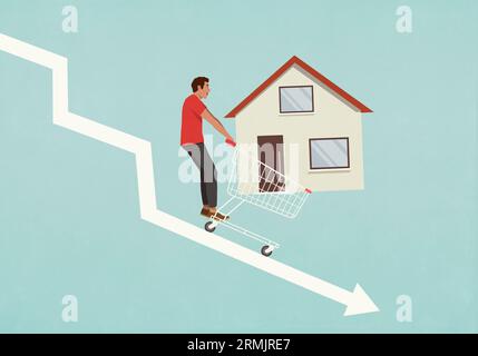 Mann mit Haus im Einkaufswagen fällt auf absteigenden Pfeil Stockfoto