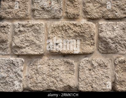 Strukturierte Rohsteinmauer Nahaufnahme Stockfoto