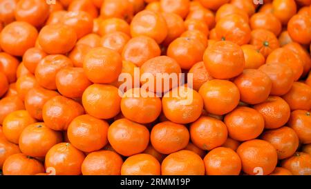 Mandarinen aus nächster Nähe. Obsthintergrund. Orange. Stockfoto