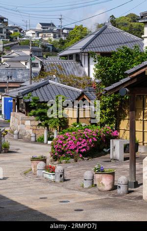 Japan, Kyushu, Beppu. Street Scene, Steam Rising from Hot Springs. Stockfoto