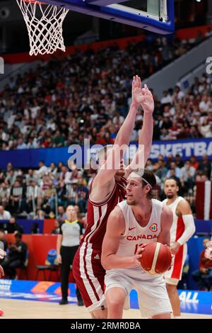 Jakarta, Jakarta, Indonesien. 29. August 2023. JAKARTA, INDONESIEN ''“ AUGUST 29: Der Kanadier Kelly Olynyk (R) wird am 29 2023. August 2023 in Jakarta (Indonesien) von dem lettischen Rodions Kurcus (L) im Spiel Kanada gegen Lettland gefordert. Die FIBA Basketball-Weltmeisterschaft 2023 findet vom 25. August bis zum 10. September 2023 in Jakarta, Indonesien, Manila, Philipines Dan Okinawa, Japan statt (Credit Image: © Sijori Images via ZUMA Press Wire) NUR REDAKTIONELL! Nicht für kommerzielle ZWECKE! Stockfoto