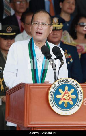 (140718) -- QUEZON CITY, 18. Juli 2014 (Xinhua) -- der philippinische Präsident Benigno Aquino III spricht während der Riten des AFP-Kommandowechsels im Camp Aguinaldo in Quezon City, Philippinen am 18. Juli 2014. Der philippinische Präsident Benigno Aquino III hat Generalleutnant Gregorio Pio Catapang, Jr. zum neuen Stabschef der Streitkräfte der Philippinen (AFP) ernannt, sagte die AFP am Mittwoch. Catapang übernahm am Freitag formell sein Amt als 45. Stabschef der AFP. (Xinhua/Rouelle Umali) (lyi) PHILIPPINEN-QUEZON STADT-MILITÄRISCHE ÄNDERUNG DES KOMMANDOS PUBLICATIONxNOTxINxCHN Quezon Stockfoto