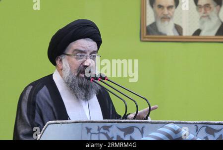 (140725) -- TEHERAN, 25. Juli 2014 (Xinhua) -- Ayatollah Ahmad Khatami, Teheraner Freitagsgebet, hält eine Rede während der jährlichen Al-Quds-Kundgebung am 25. Juli 2014 in Teheran, Iran. Hunderttausende Iraner versammelten sich am Freitag im ganzen Land, um den Tag von Quds (Jerusalem) in Solidarität mit den Palästinensern zu feiern, und verurteilten Israels fortgesetzte Besetzung palästinensischer Länder und die jüngsten blutigen Angriffe auf den Gazastreifen. (Xinhua/Ahmad Halabisaz) IRAN-TEHERAN-RAMDAN-Al-QUDS-TAGESVERANSTALTUNG PUBLICATIONxNOTxINxCHN TEHERAN Juli 25 2014 XINHUA Ayatollah Ahmad Khatami TEHERAN Freitag beten Stockfoto