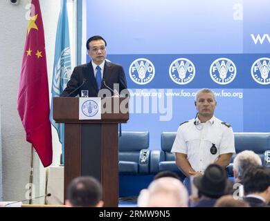 (141015) -- ROM, 15. Oktober 2014 -- der chinesische Premierminister Li Keqiang (L) hält eine Rede am Hauptsitz der Ernährungs- und Landwirtschaftsorganisation der Vereinten Nationen (FAO) in Rom, Italien, 15. Oktober 2014. ) (wf) ITALIEN-FAO-LI KEQIANG-SPEECH WangxYe PUBLICATIONxNOTxINxCHN Rom OKT 15 2014 Chinesischer Ministerpräsident Keqiang l hält eine Rede AM Sitz der Ernährungs- und Landwirtschaftsorganisation der Vereinten Nationen FAO in Rom Italien OKT 15 2014 WF Italien FAO links Keqiang Speech WangXYe PUBLATIONxNOTxCHINxCHN Stockfoto