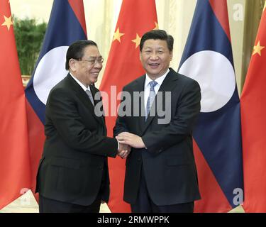 (141108) -- PEKING, 8. November 2014 -- der chinesische Präsident Xi Jinping (R) trifft sich mit dem laotischen Präsidenten Choummaly Sayasone in der Großen Halle des Volkes in Peking, der Hauptstadt Chinas, am 8. November 2014. ) (Zkr) CHINA-BEIJING-XI JINPING-LAOS-CHOUMMALY SAYASONE-MEETING (CN) PangxXinglei PUBLICATIONxNOTxINxCHN Peking 8. November 2014 der chinesische Präsident Xi Jinping r trifft sich mit LAO-Präsident Choummaly Sayasone in der Großen Halle der Berühmtheiten in Peking Hauptstadt von China, 8. November 2014 Stockfoto