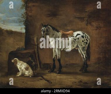 Ein Piebald-Pferd, das an einen Stützpunkt gebunden ist, und zwei Hunde vor einem gasthaus von Pieter Cornelisz Verbeeck Stockfoto