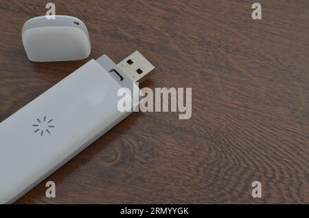 Die neueste Generation des USB 5G-Modems schließt sich für eine Internetverbindung und ermöglicht so eine schnelle, effiziente und moderne Verbindung. 5G-Chip-Technologie sorgt für mobile Geschwindigkeit Stockfoto