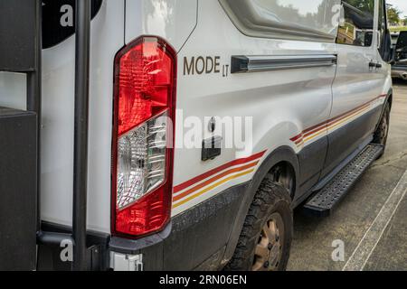 Loveland, CO, USA - August 26, 2023: Detail of 4x4 Storyteller Overland MODE LT camper van built on Ford Transit chassis. Stockfoto