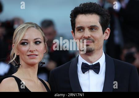 Olivia Hamilton und Damien Chazelle besuchen den ersten roten Teppich beim 80. Internationalen Filmfestival von Venedig am 30. August 2023 in Venedig. Stockfoto