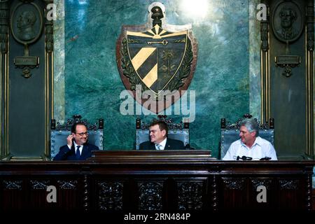 (150511) -- HAVANNA, 11. Mai 2015 -- der französische Präsident Francois Hollande (L) hält am 11. Mai 2015 eine Rede in Begleitung des kubanischen Vizepräsidenten Miguel Diaz-Canel (R) an der Universität von Havanna, Kuba. Francois Hollande forderte ein Ende des US-Embargos gegen Kuba. KUBA-HAVANNA-FRANCE-HOLLANDE-SPEECH LiuxBin PUBLICATIONxNOTxINxCHN 150511 Havanna 11. Mai 2015 französischer Präsident Francois Hollande l hält eine Rede IN Begleitung des kubanischen Vizepräsidenten Miguel Diaz Canel r an der Universität von Havanna Kuba 11. Mai 2015 Francois Hollande forderte DIE Beendigung des US-Embargos GEGEN Kuba Havanna Frankreich Stockfoto