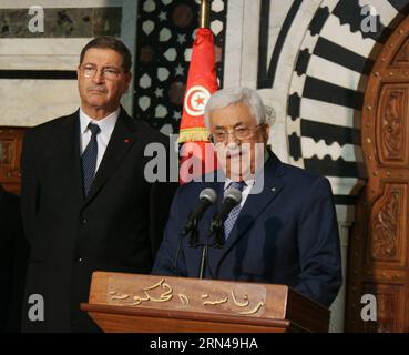 TUNIS, 13. Mai 2015 -- der palästinensische Präsident Mahmoud Abbas (R) spricht auf einer Pressekonferenz in Tunis, Tunesien, am 13. Mai 2015. TUNESIEN-TUNIS-PALÄSTINA-PRÄSIDENT AdelxEzzine PUBLICATIONxNOTxINxCHN Tunis 13. Mai 2015 PALÄSTINENSISCHER Präsident Mahmoud Abbas r spricht auf einer Pressekonferenz in Tunis Tunesien 13. Mai 2015 Tunis Palästina-Präsident Tunis vist PUBLICATIONxNOTxINxCHN Stockfoto