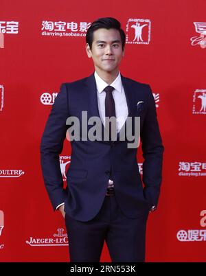 (150613) -- SHANGHAI, 13. Juni 2015 -- Schauspieler Eddie Peng geht auf dem roten Teppich beim 18. Shanghai International Film Festival in Shanghai, Ostchina, 13. Juni 2015. Das 9-tägige Festival begann am Samstag. ) (mp) CHINA-SHANGHAI-FILM FESTIVAL-OPEN (CN) DingxTing PUBLICATIONxNOTxINxCHN Shanghai 13. Juni 2015 Schauspieler Eddie Peng Walks the Red Carpet BEIM 18. Shanghai International Film Festival in Shanghai East China 13. Juni 2015 das 9-tägige Festival startete AM Samstag MP China Shanghai Film Festival Open CN DingxTing PUBLICATIONxNOTxINxCHN Stockfoto