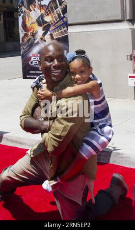 Tyrese Gibson und seine Tochter nahmen am 23. Juni 2015 an der Premiere von Universal Studios Hollywood's Thrill Ride, fast & Furious - Supercharged in Universal City of California, USA, Teil. (nxl) US-HOLLYWOOD-UNIVERSAL STUDIO- FAST & FURIOUS -THRILL RIDE-PREMIERE YangxLei PUBLICATIONxNOTxINxCHN Tyrese Gibson und seine Tochter besuchen die Premiere der Universal Studios Hollywood S Thrill Ride Almost & Furious Supercharged in Universal City of California the United States AM 23. Juni 2015 nxl U.S. Hollywood Universal Studio Almost & Furious Thrill Ride Premiere YangxLei PUBLICATIONxNOT Stockfoto