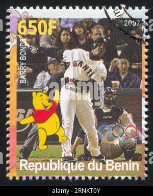 BENIN - UM 2007: Briefmarke von Benin, zeigt Barry Bonds, Disney Caharacter und Olympic Rings, um 2007 Stockfoto