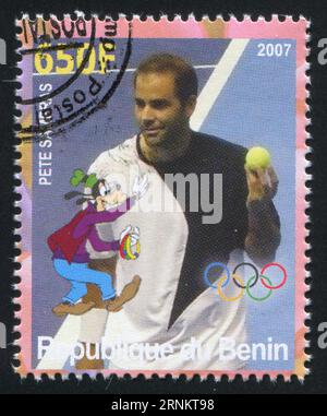 BENIN - CA. 2007: Briefmarke von Benin, zeigt Pete Sampras, Disney Caharacter und Olympic Rings, ca. 2007 Stockfoto