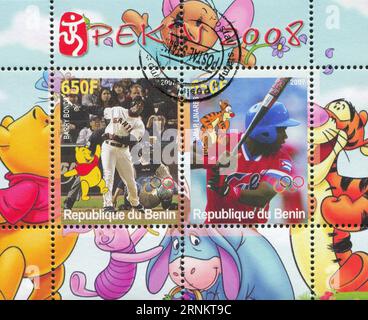 BENIN - CA. 2007: Briefmarke von Benin, zeigt Omar Linares, Disney Caharacter und Olympic Rings, ca. 2007 Stockfoto