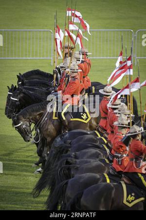 (170819) -- VANCOUVER, 19. August 2017 -- Rider and Horses treten beim RCMP Musical Ride Event im Burnaby's Central Park in Vancouver, Kanada, am 18. August 2017 auf. Die Royal Canadian Mounted Police (RCMP) Musical Ride ist eine einzigartige kanadische Performance mit einer Truppe von 32 Pferden und Reitern, die choreografierte Kavallerie-Übungen zu Musik durchführen. )(yk) CANADA-VANCOUVER-RCMP-MUSICAL RIDE Liangxsen PUBLICATIONxNOTxINxCHN Vancouver 19. August 2017 Rider and Horses treten BEIM RCMP Musical Ride Event IM Burnaby S Central Park in Vancouver Kanada auf 18. August 2017 The Royal Canadian Mounted Police RCMP Music Stockfoto