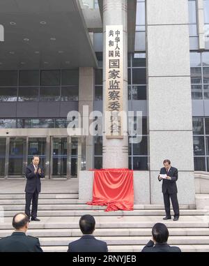 (180323) -- PEKING, 23. März 2018 -- Zhao Leji (L), Mitglied des Ständigen Ausschusses des Politbüros des Zentralkomitees der Kommunistischen Partei Chinas (CPC) und Sekretär der Zentralkommission für Disziplin-Inspektion (CCDI), nimmt an der Einweihungszeremonie der nationalen aufsichtskommission Chinas in Peking, Hauptstadt Chinas, am 23. März 2018 Teil. ) (lx) INAUGURATION der CHINA-BEIJING-NATIONAL SUPERVISORY COMMISSION(CN) LixTao PUBLICATIONxNOTxINxCHN Stockfoto