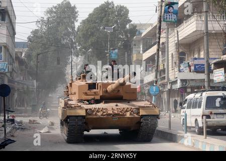 Themen der Woche Bilder des Tages 180324 -- AFRIN SYRIEN, 24. März 2018 -- Ein türkischer Militärpanzer marschiert am 24. März 2018 auf einer Straße in Afrin, Syrien, vor. Die syrische Region Afrin wurde im Rahmen der laufenden Operation Olive Branch unter volle Kontrolle gebracht, teilte das türkische Militär am Samstag mit. SYRIEN-AFRIN-TÜRKISCHE ARMEE-VOLLE KONTROLLE XINHUA PUBLICATIONXNOTXINXCHN Stockfoto