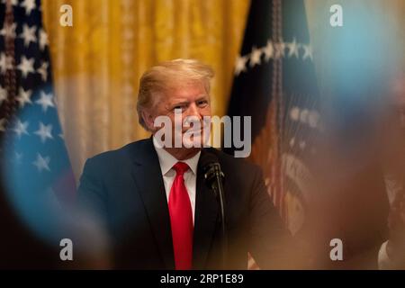 News Bilder des Tages (180629) -- WASHINGTON, 29. Juni 2018 -- US-Präsident Donald Trump äußert sich am 29. Juni 2018 im Weißen Haus in Washington D.C. zum Tax Cuts and Jobs Act. US-WASHINGTON D.C.-TRUMP-TAX-REMARKS TINGXSHEN PUBLICATIONXNOTXINXCHN Stockfoto