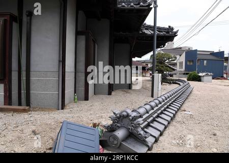 (180711) -- HIROSHIMA, 11. Juli 2018 -- Foto aufgenommen am 11. Juli 2018, zeigt ein überflutetes Haus in einem überfluteten Gebiet in Kure, Hiroshima, Südwestjapan, 11. Juli 2018. Die Zahl der Todesopfer nach sintflutartigen Regenfällen, die Westjapan heimsuchten und verheerende Überschwemmungen und tödliche Erdrutsche verursachten, erreichte am Mittwoch 176, sagten die Behörden. )(yg) JAPAN-HIROSHIMA-WETTER MaxPing PUBLICATIONxNOTxINxCHN Stockfoto