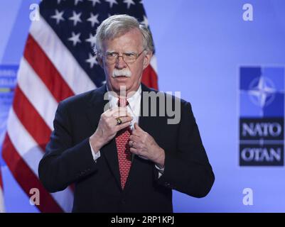 (180712) -- BRÜSSEL, 12. Juli 2018 -- der nationale Sicherheitsberater der USA John Bolton nimmt am zweiten Tag des NATO-Gipfels am 12. Juli 2018 in Brüssel, Belgien, an einer Pressekonferenz des US-Präsidenten Donald Trump Teil. ) (lrz) BELGIEN-BRÜSSEL-NATO-GIPFEL YexPingfan PUBLICATIONxNOTxINxCHN Stockfoto