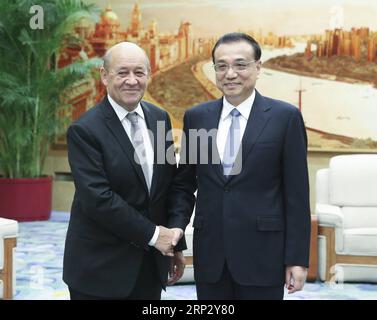 (180914) -- PEKING, 14. September 2018 -- der chinesische Ministerpräsident Li Keqiang (R) trifft sich mit dem französischen Außenminister Jean-Yves Le Drian in Peking, der Hauptstadt Chinas, 14. September 2018. ) (wyl) CHINA-BEIJING-LI KEQIANG-FRANCE-MEETING (CN) YaoxDawei PUBLICATIONxNOTxINxCHN Stockfoto