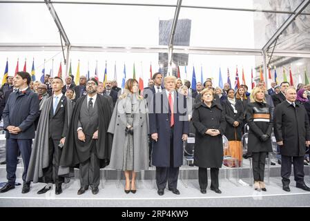 181111 -- PARIS, 11. November 2018 -- der russische Präsident Wladimir Putin 1st R, Front, die deutsche Kanzlerin Angela Merkel 3rd R, Front und der US-Präsident Donald Trump 4th R, Front nehmen an einer Zeremonie zum hundertsten Jahrestag des Waffenstillstands des Ersten Weltkriegs in Paris, Frankreich, 11. November 2018, Teil. FRANKREICH-PARIS-WWI-GEDENKEN ChenxYichen PUBLICATIONxNOTxINxCHN Stockfoto