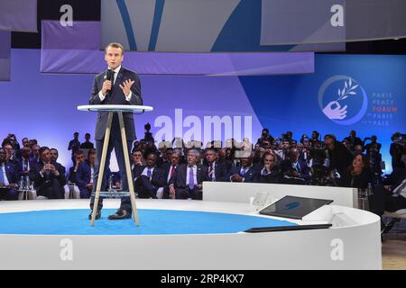 (181111) -- PARIS, 11. November 2018 -- der französische Präsident Emmanuel Macron spricht am 11. November 2018 vor dem Pariser Friedensforum in Paris, Frankreich. Das Pariser Friedensforum begann am Sonntag mit Reden des französischen Präsidenten Emmanuel Macron, der deutschen Bundeskanzlerin Angela Merkel und des UN-Generalsekretärs Antonio Guterres, die anlässlich des hundertsten Jahrestages des Waffenstillstands des Ersten Weltkriegs zu nachhaltigen Friedensbemühungen aufriefen. FRANKREICH-PARIS-PARIS-FRIEDENSFORUM ChenxYichen PUBLICATIONxNOTxINxCHN Stockfoto