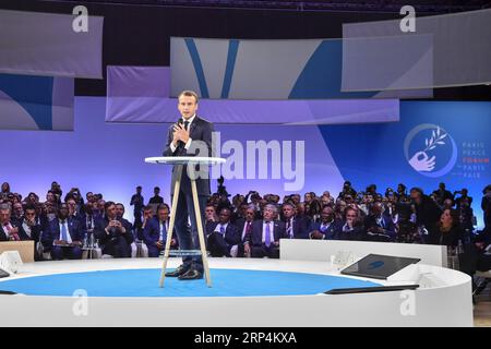 (181111) -- PARIS, 11. November 2018 -- der französische Präsident Emmanuel Macron spricht am 11. November 2018 vor dem Pariser Friedensforum in Paris, Frankreich. Das Pariser Friedensforum begann am Sonntag mit Reden des französischen Präsidenten Emmanuel Macron, der deutschen Bundeskanzlerin Angela Merkel und des UN-Generalsekretärs Antonio Guterres, die anlässlich des hundertsten Jahrestages des Waffenstillstands des Ersten Weltkriegs zu nachhaltigen Friedensbemühungen aufriefen. FRANKREICH-PARIS-PARIS-FRIEDENSFORUM ChenxYichen PUBLICATIONxNOTxINxCHN Stockfoto
