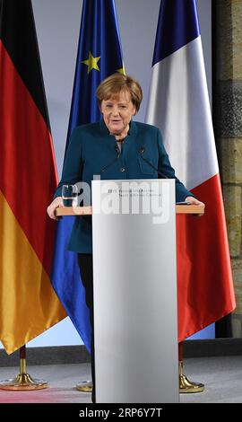 (190122) -- AACHEN, 22. Januar 2019 (Xinhua) -- Bundeskanzlerin Angela Merkel hält eine Rede anlässlich der Unterzeichnung des Aachener vertrags am 22. Januar 2019 in Aachen. Bundeskanzlerin Angela Merkel und der französische Präsident Emmanuel Macron haben am Dienstag einen Vertrag zur Erneuerung der Freundschaft und Zusammenarbeit zwischen den beiden Ländern unterzeichnet. Der sogenannte Aachener vertrag, der von Merkel und Macron unterzeichnet wurde, strebt eine engere Zusammenarbeit zwischen Deutschland und Frankreich in der Wirtschafts-, Verteidigungs- und Europapolitik an. Der Aachener vertrag steht im Einklang mit dem 1963 unterzeichneten Elysee-vertrag. (Xinhua/Lu Yang) DEUTSCHLAND-AACHEN Stockfoto