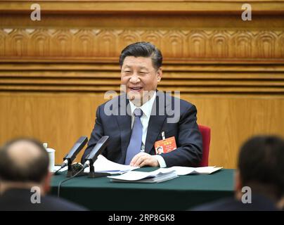 (190305) -- PEKING, 5. März 2019 -- der chinesische Präsident Xi Jinping, ebenfalls Generalsekretär des Zentralkomitees der Kommunistischen Partei Chinas (KPCh) und Vorsitzender der Zentralen Militärkommission, Teilnahme an einer Podiumsdiskussion mit seinen Kollegen aus der Autonomen Region der Inneren Mongolei auf der zweiten Sitzung des 13. Nationalen Volkskongresses in Peking, Hauptstadt Chinas, 5. März 2019. ) (ZWEI SITZUNGEN)CHINA-PEKING-XI JINPING-NPC-PANEL-DISKUSSION (CN) XIEXHUANCHI PUBLICATIONXNOTXINXCHN Stockfoto