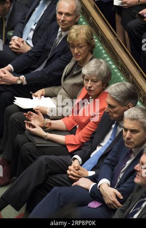 (190312) -- LONDON, 12. März 2019 -- die britische Premierministerin Theresa May (4. R) wird während der Brexit-Abstimmung im britischen Unterhaus am 12. März 2019 gesehen. Der Brexit-Deal der britischen Premierministerin Theresa May wurde am Dienstag bei der zweiten sinnvollen Abstimmung im parlament seit Januar erneut abgelehnt, wodurch die Unsicherheit darüber, wie das Land die Europäische Union verlassen wird, zunahm. BRITISCHES PARLAMENT/) HOECHSTKREDIT: BRITISCHES PARLAMENT/GROSSBRITANNIEN-LONDON-BREXIT-DEAL-ABLEHNUNG MARKXDUFFY PUBLICATIONXNOTXINXCHN Stockfoto