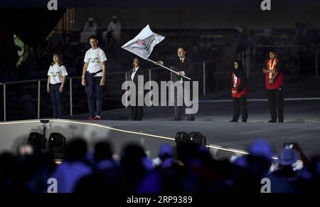 (190322) -- ABU DHABI, 22. März 2019 (Xinhua) -- die Flagge der Special Olympics wird während der Abschlusszeremonie der Abu Dhabi Special Olympics World Games 2019 in Abu Dhabi, den Vereinigten Arabischen Emiraten, am 21. März 2019 gewellt. (Xinhua/Xia Yifang) (SP)VAE-ABU DHABI-SPECIAL OLYMPICS-ABSCHLUSSZEREMONIE PUBLICATIONxNOTxINxCHN Stockfoto