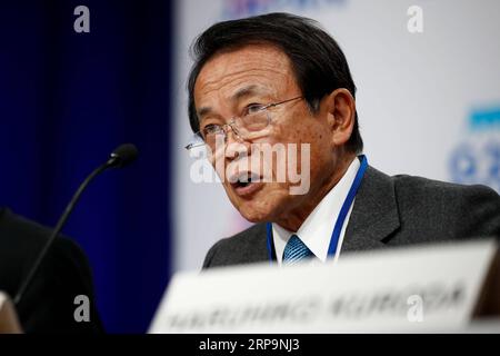 (190412) -- WASHINGTON, 12. April 2019 -- der japanische Finanzminister Taro Aso spricht während einer Pressekonferenz nach Treffen der Finanzminister und Zentralbankgouverneure der G20 in Washington D.C., USA, am 12. April 2019. Taro Aso forderte am Freitag die Gruppe der zwanzig (G20) Mitglieder auf, auf eine mögliche Eskalation der Handelsspannungen zu achten, da sich die Weltwirtschaft weiter verlangsamt und zahlreiche Herausforderungen in Zukunft zu bewältigen sind. ) US-WASHINGTON D.C.-JAPAN-FINANZMINISTER-PRESSEKONFERENZ TINGXSHEN PUBLICATIONXNOTXINXCHN Stockfoto