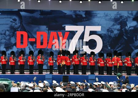 (190605) -- PORTSMOUTH (GROSSBRITANNIEN), 5. Juni 2019 () -- das Foto vom 5. Juni 2019 zeigt die D-Day-Gedenkfeiern in Portsmouth, Großbritannien. Die britische Premierministerin Theresa May und 15 führende Politiker aus aller Welt schlossen sich am Mittwoch Königin Elizabeth II. In der englischen Hafenstadt Portsmouth an, um an den 75. Jahrestag der Landung am D-Day zu erinnern. () -UK OUT- BRITAIN-PORTSMOUTH-D-DAY REMEMBER XINHUA PUBLICATIONXNOTXINXCHN Stockfoto